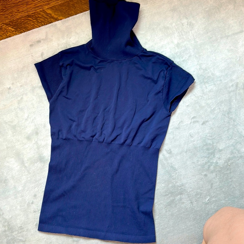 Brand new nylon/spandex Bebe short sleeve turtleneck in gorgeous navy, size M/L